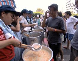 Volunteers serve food to Taiwan quake victims